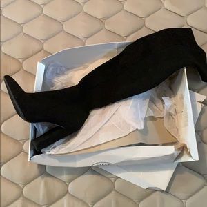 Thigh high stretchy Steve Madden boot